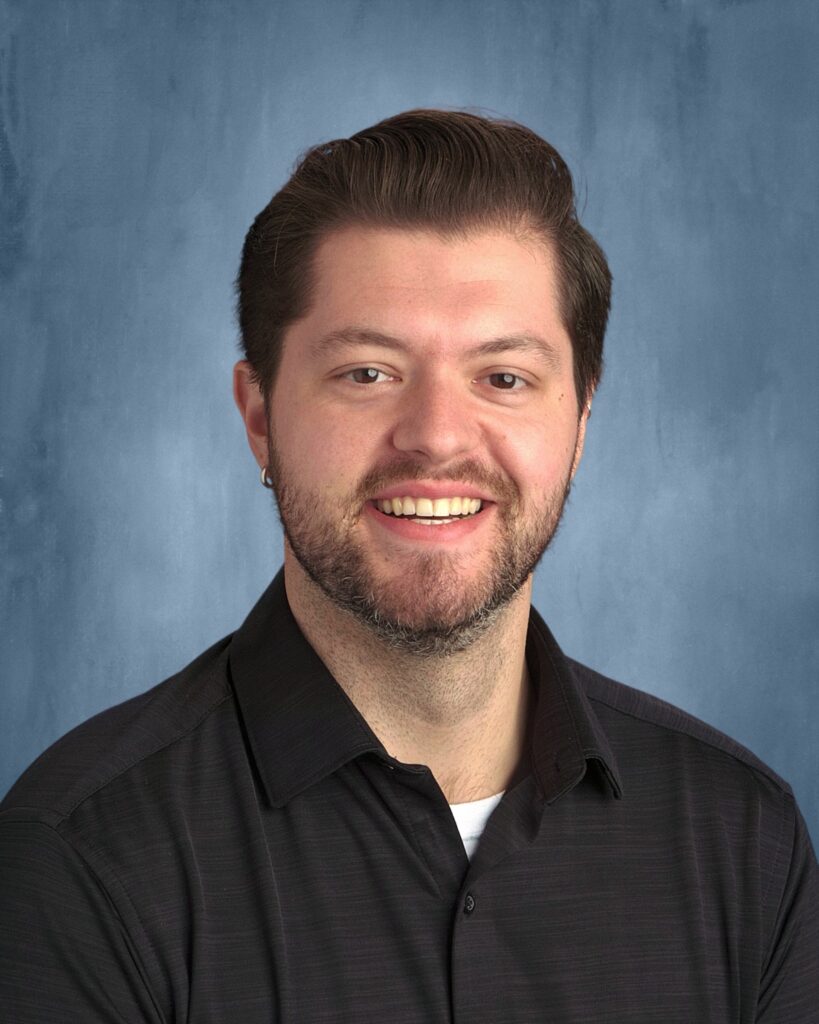 Headshot Image of Cody Messersmith the vocal director